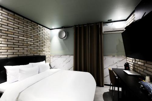 Katil atau katil-katil dalam bilik di Stay 25 Hotel