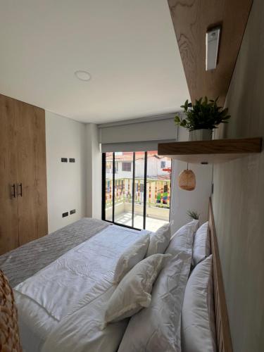 Ένα ή περισσότερα κρεβάτια σε δωμάτιο στο Casa Berlín, Lake Access