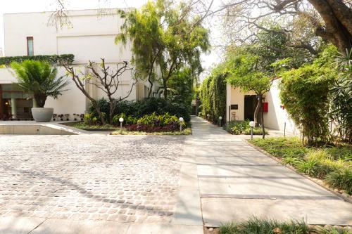 Zahrada ubytování The Manor - New Delhi