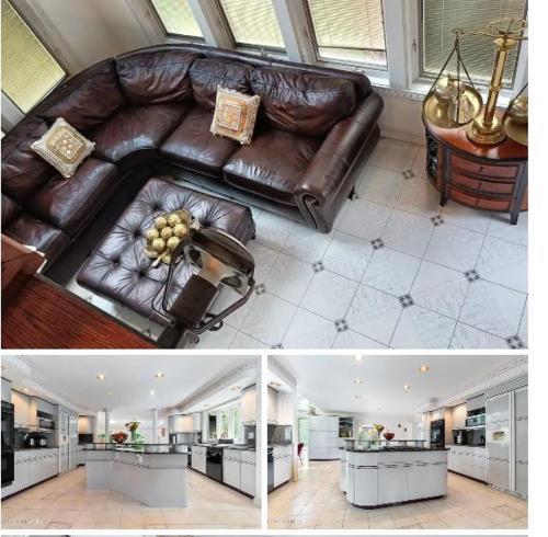 un soggiorno con divano in pelle marrone di Luxury Mansion Rentals in Niskayuna, NY (USA) a Schenectady