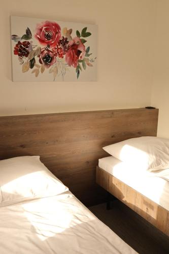 Postel nebo postele na pokoji v ubytování Golden Golem hotel & Spa