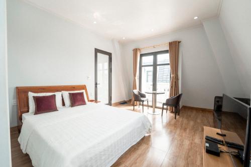 Ένα ή περισσότερα κρεβάτια σε δωμάτιο στο Riverside Row Apartment