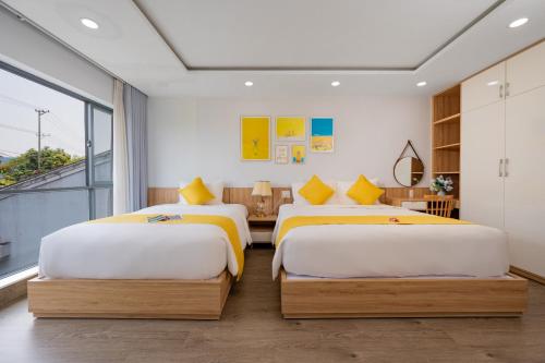 Giường trong phòng chung tại LASANTA Villa