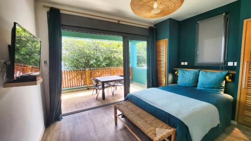 Ένα ή περισσότερα κρεβάτια σε δωμάτιο στο Écrin de mer Studios de charme