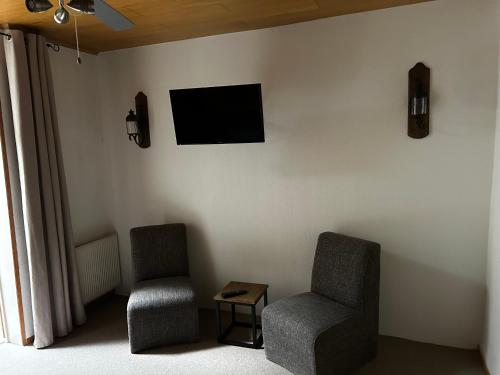 Una televisión o centro de entretenimiento en City B&B Cochem