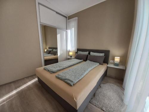 Posteľ alebo postele v izbe v ubytovaní Villa Bori Siófok