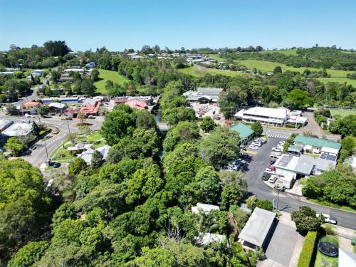 an aerial view of a small town with trees at Tranquil Getaways On Obi Maleny in Maleny