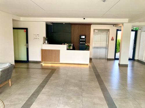 Lobi atau kawasan kaunter penerimaan di e-baltic - Niechorze, Your beachfront apartments,