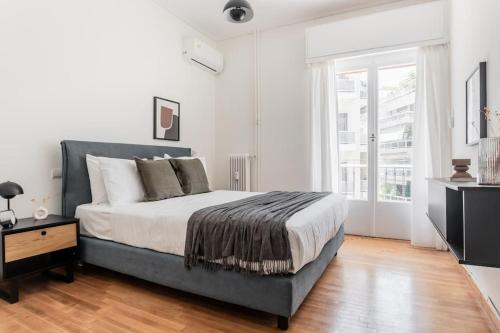 Acropolis Sunlight 2BR Apartment by UPSTREET