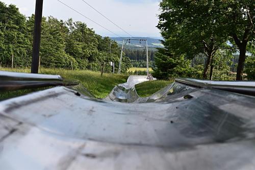 a skate park with a skateboard ramp in a park at Deutsches Haus Hotel Restaurant Gastwirtschaft Biergarten am Radweg Bermuthshain in Bermuthshain
