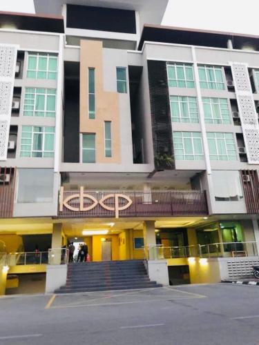 a large building with stairs in front of it at FirIzzkey Studio in Kota Bharu