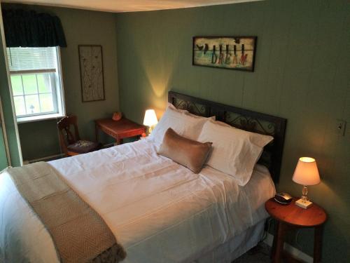 Voodi või voodid majutusasutuse The Frogtown Inn toas