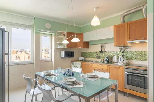 Η κουζίνα ή μικρή κουζίνα στο Patio da Rocha - Silhueta Citadina