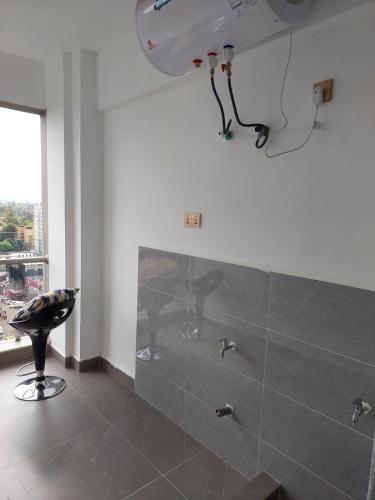 Ένα μπάνιο στο Luxury Apartment Lavington