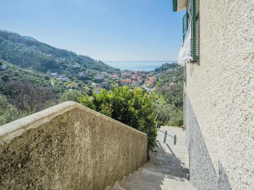 a stairway leading up to a building with a view at Holiday Home Sorvegallo by Interhome in Moneglia