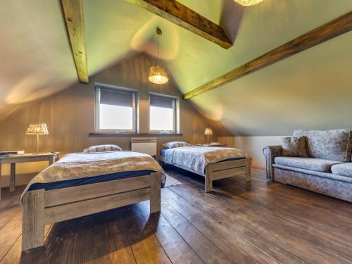 Katil atau katil-katil dalam bilik di Holiday Home Jura dla Ciebie by Interhome