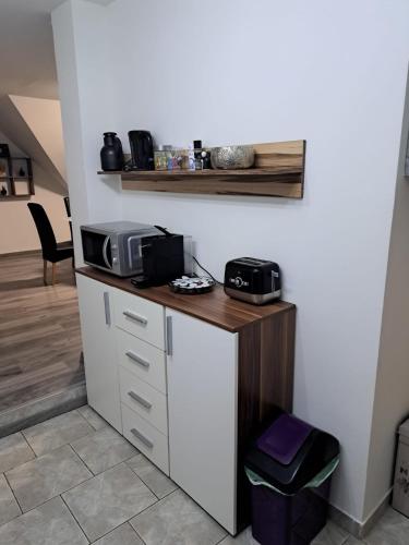 a kitchen with a counter with a microwave on it at Gamlitz - Eckberg in Gamlitz