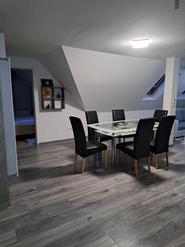 a dining room with a table and chairs at Gamlitz - Eckberg in Gamlitz