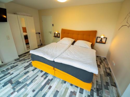 Apartment Am Kirchberg by Interhomeにあるベッド