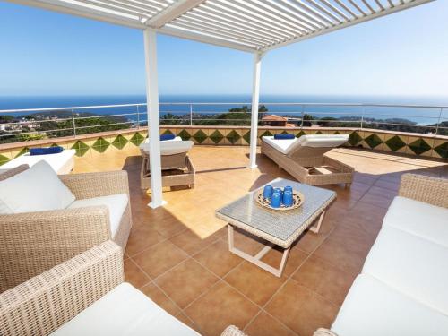 un patio con vista al mar en Villa Panorama-1 by Interhome, en Lloret de Mar