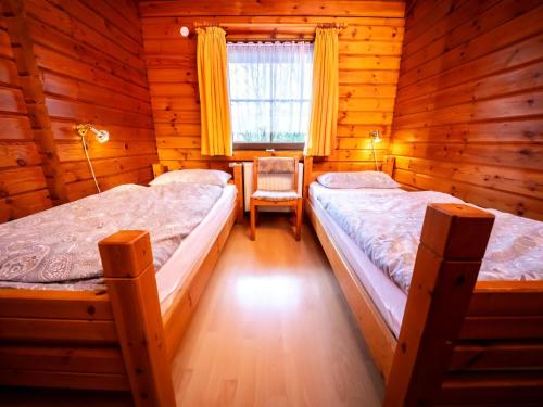 Katil atau katil-katil dalam bilik di Chalet Geli by Interhome