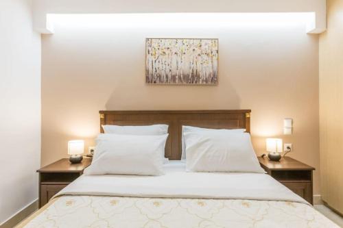 Katil atau katil-katil dalam bilik di Varkiza Seaside 2BD Apartment