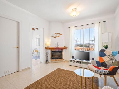 TV a/nebo společenská místnost v ubytování Holiday Home Las Mimosas by Interhome