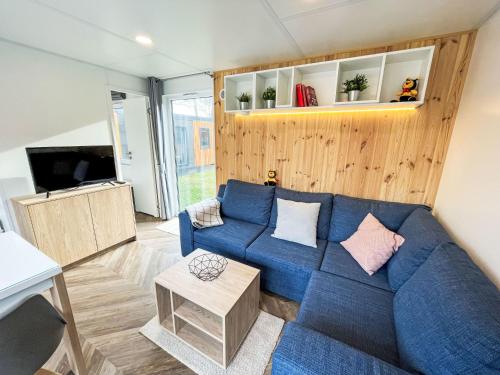 TV a/nebo společenská místnost v ubytování Holiday Home Tiny Haus Königshaus by Interhome