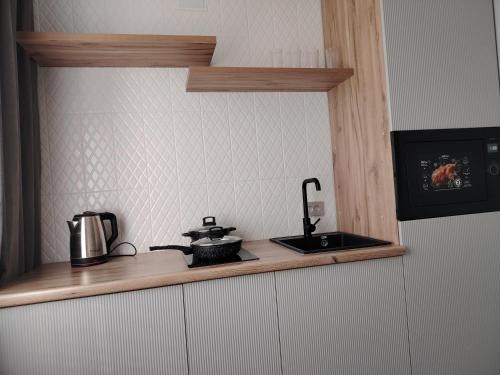 Una cocina o zona de cocina en Однакомнатная LUX квартира