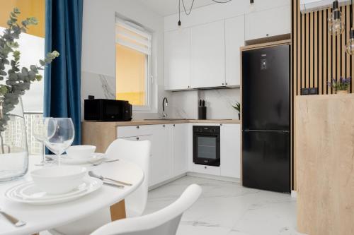 Kjøkken eller kjøkkenkrok på Stylish Apartments with Parking by Renters