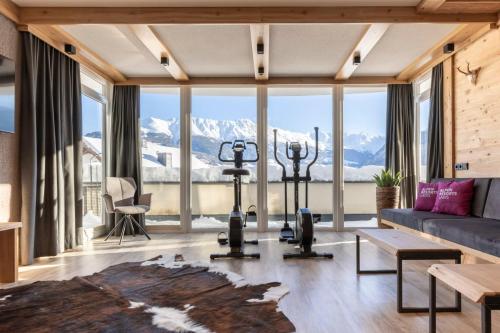 a living room with a view of the mountains at ALPENAPART LADIS ehemals Alpenapart Alexander in Ladis