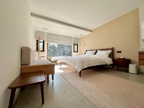 Postel nebo postele na pokoji v ubytování Hangzhou XianQingShan Homestay Westlake