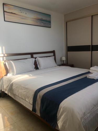 Cama o camas de una habitación en wailoaloa CC 泳池公寓
