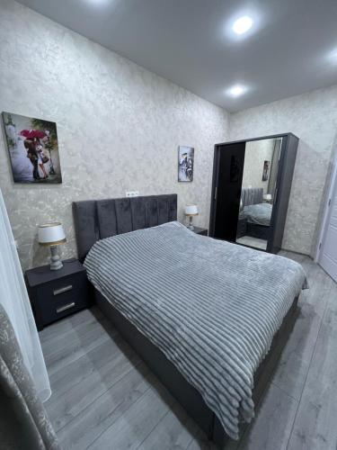 Postel nebo postele na pokoji v ubytování Welcome apartament
