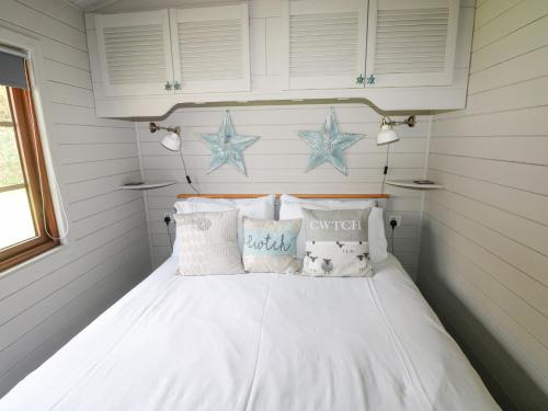 Ένα ή περισσότερα κρεβάτια σε δωμάτιο στο Touchwood Lodge