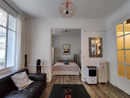 Postelja oz. postelje v sobi nastanitve Nice and cozy 1b apartment in the heart of Paris