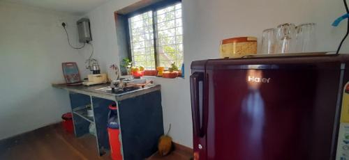 Kuchyň nebo kuchyňský kout v ubytování Arpita FarmStay
