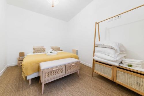 Ένα ή περισσότερα κρεβάτια σε δωμάτιο στο Jolie 2 pieces 35m2 bien équipée 4P - Paris 20