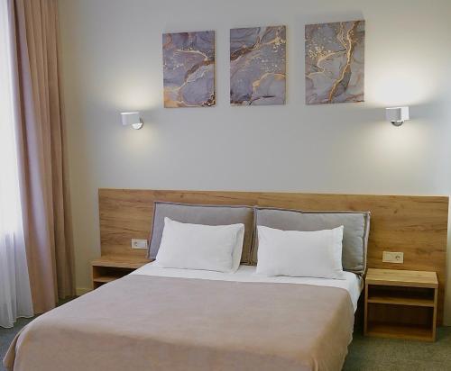 Een bed of bedden in een kamer bij Duboviy Gai Hotel