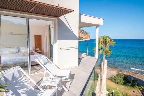 a villa with a view of the ocean at Melbeach Hotel & Spa - Adults Only in Canyamel