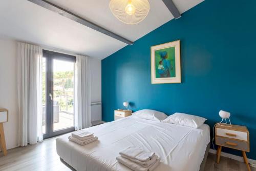 Krevet ili kreveti u jedinici u objektu Chez Robert - luxueuse villa à proximité des plages avec une piscine privée