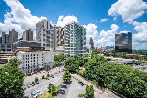a view of a city skyline with tall buildings at Downtown Atlanta Condo! Onsite Parking! LM908 in Atlanta