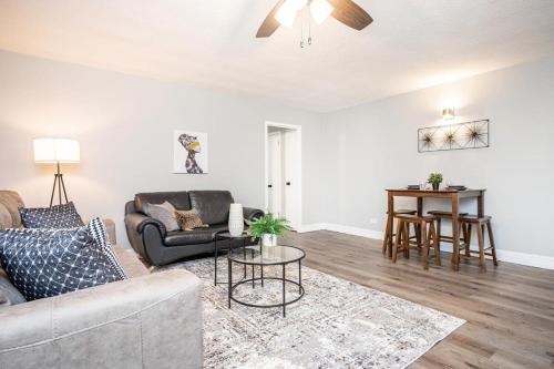 a living room with a couch and a table at ATL Downtown Private Balcony 24h Concierge PT6F in Atlanta