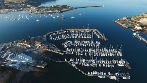 an aerial view of a marina with boats in the water at Jo on the Hoe in Plymouth
