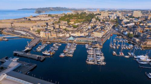 an aerial view of a harbor with boats in the water at Jo on the Hoe in Plymouth