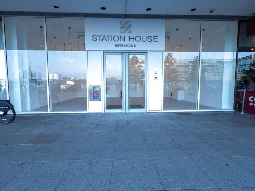 a building with the entrance to a station house at Stunning City View Apartments in Milton Keynes Central Location Free Parking in Milton Keynes