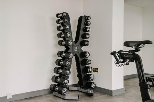 a gym with a rack of wine bottles at The Halyard Liverpool, Vignette Collection by IHG in Liverpool