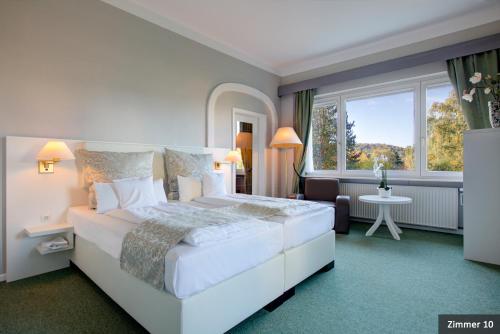 Postel nebo postele na pokoji v ubytování Hotel See-Villa