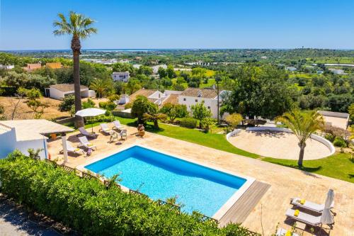 an aerial view of a villa with a swimming pool at Casa do Carmo in Moncarapacho