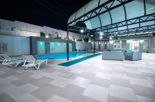 Bazén v ubytování شاليه gerasa breeze resort nebo v jeho okolí